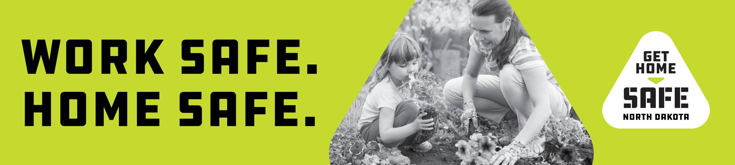 Work Safe. Home Safe. Mother and Daughter Spring Flower Planting